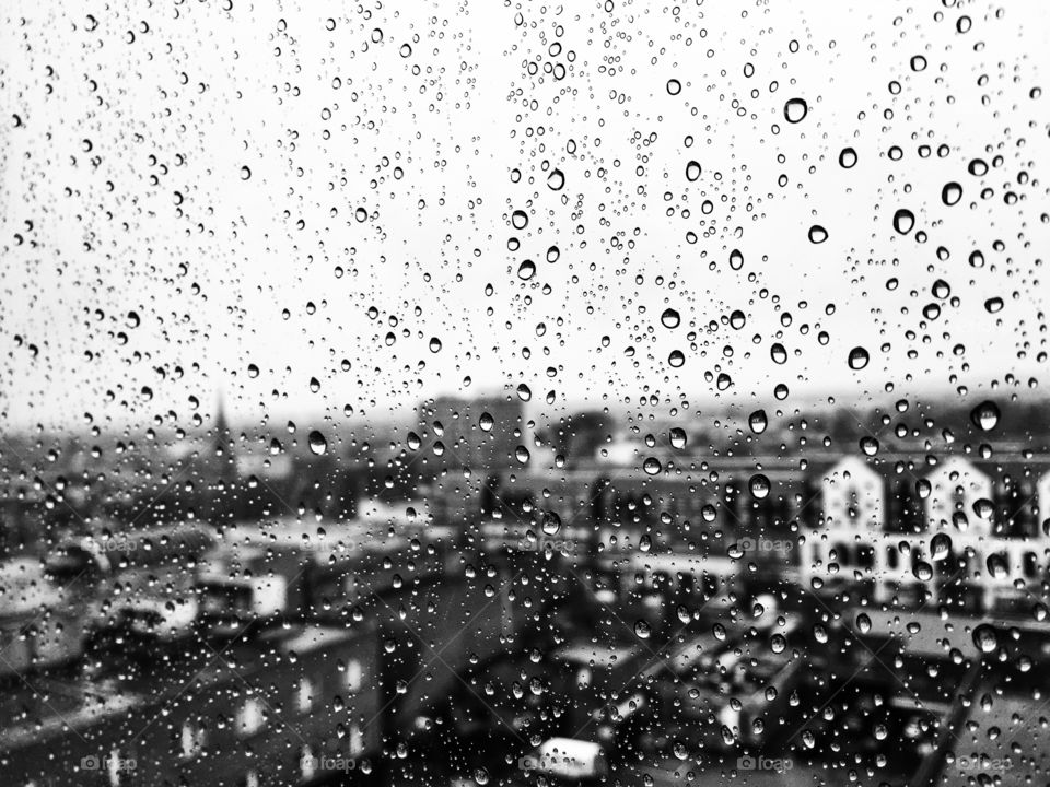 Rainy day view over Romford centre seen through window