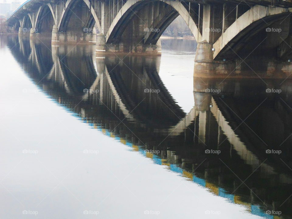 reflection of the bridge on the Dnieper river,Kiev