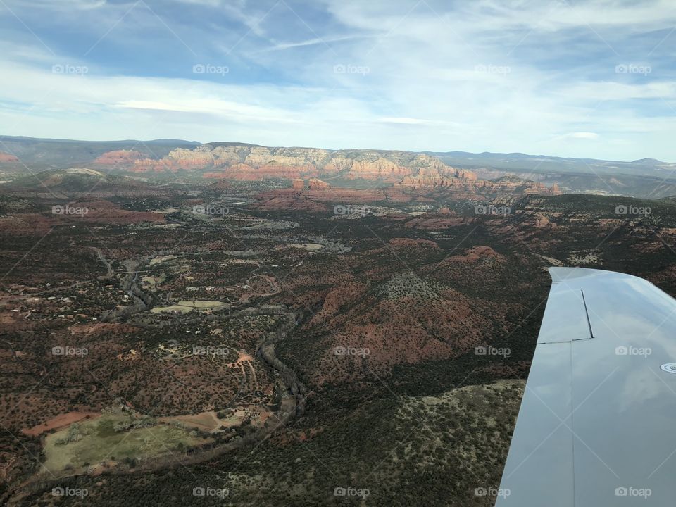 View from an airplane over the red rock canyons if Arizona