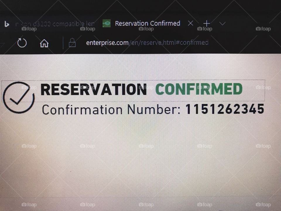 Reservation confirmation number on a computer screen