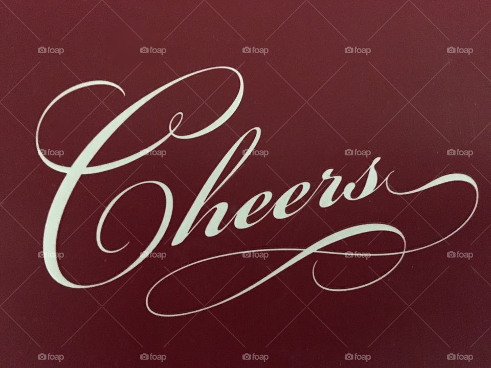 Cheers script on red