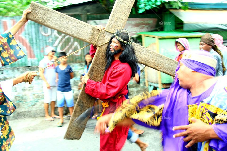 catholic devotees reenact the death of jesus christ on good friday during holy week in cainta, rizal, philippines, asia