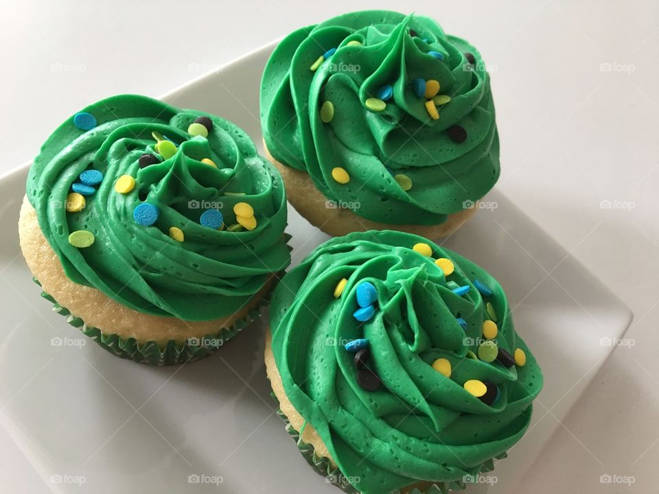 White Cupcakes with Green Buttercream Frosting 