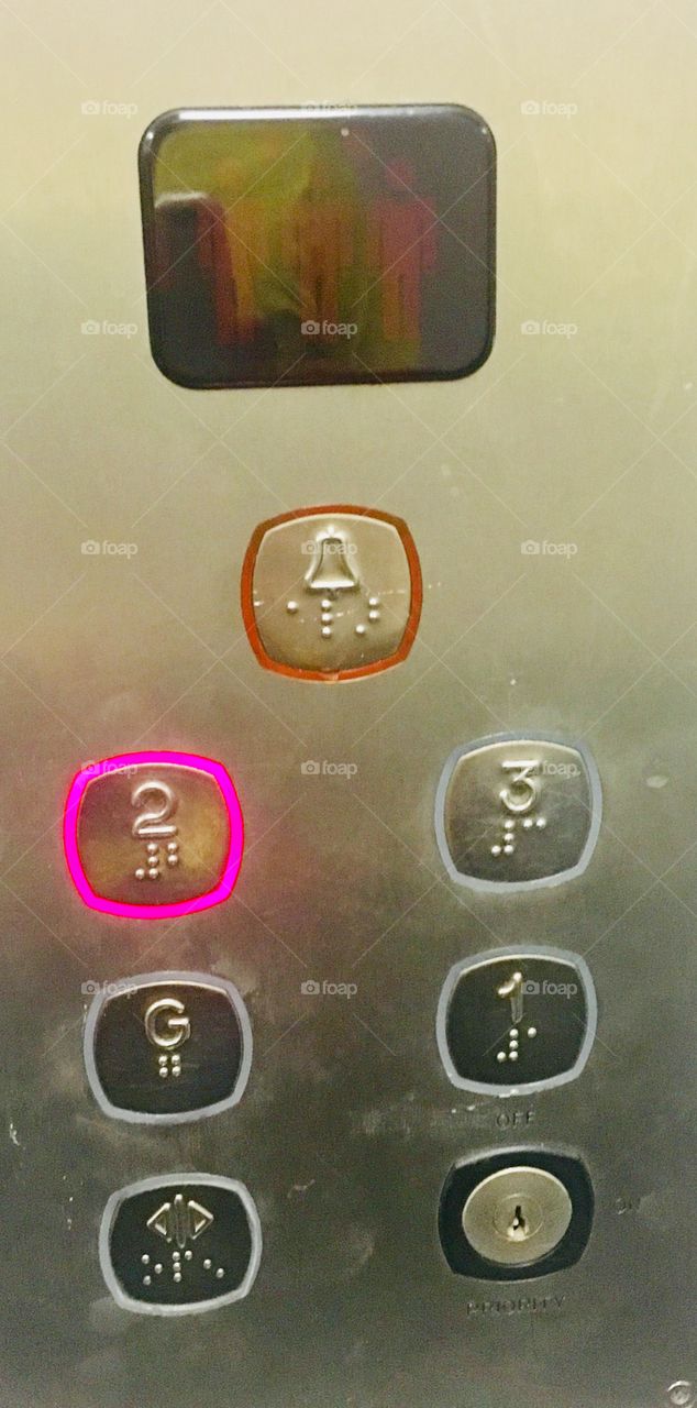 Numbers on control panel of lift - number two selected