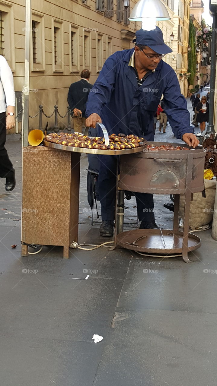 Chestnut vendor on the street in Rome, Italy