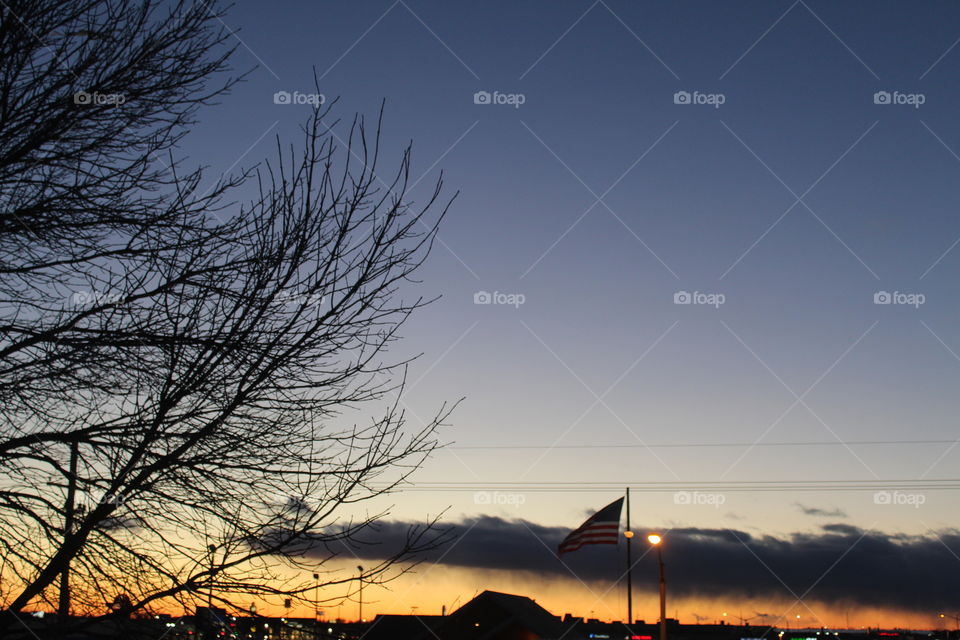 Beautiful sunset in Nebraska with American flag