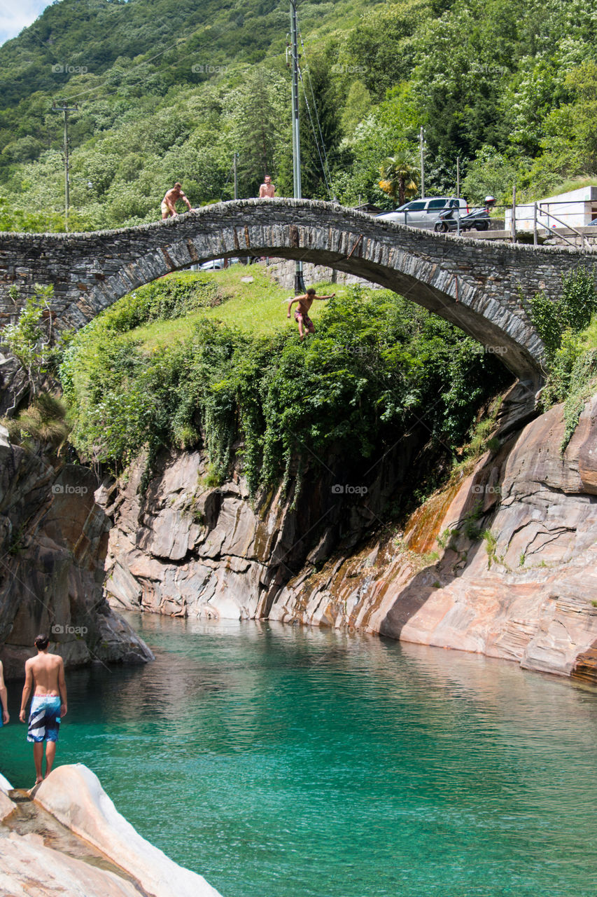 Man jumping off the bridge