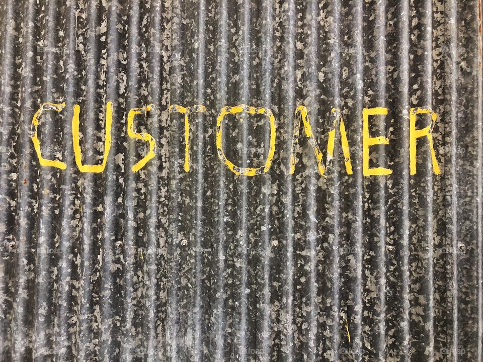 Custom painted customer parking sign 