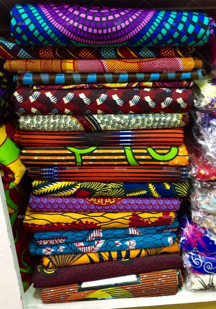 Colourful pagnes of African fabric.