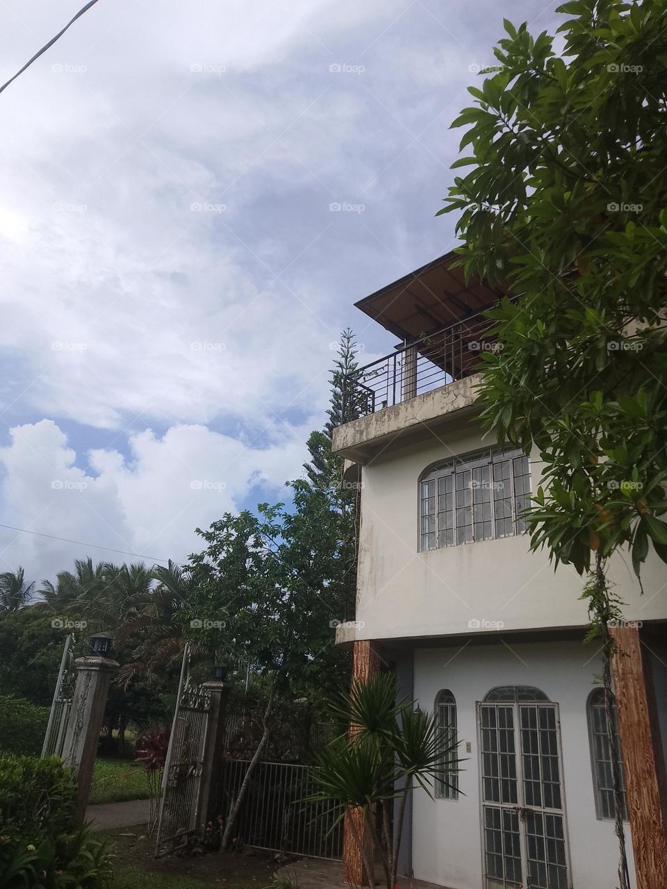 cloud's dominating the blue sky