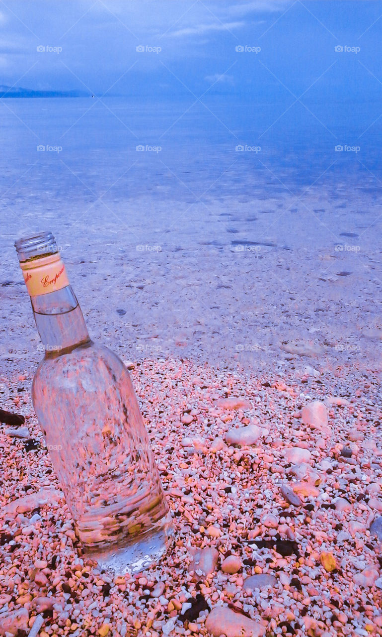 A bottle in the shore