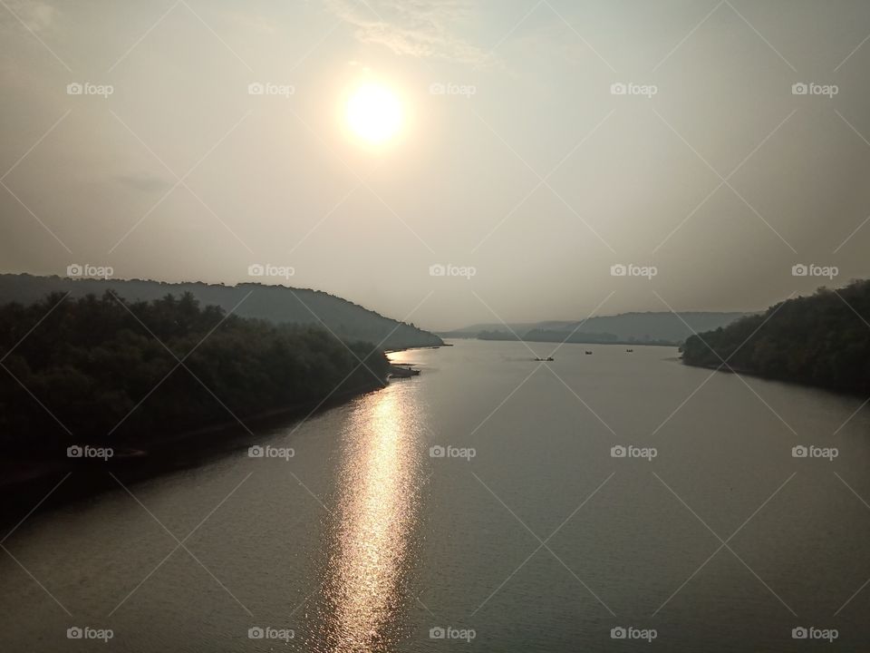 Sunrise shadow in water