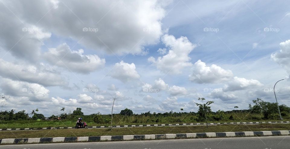 clouds in jalan Sudirman Pekanbaru at 02.30 pm