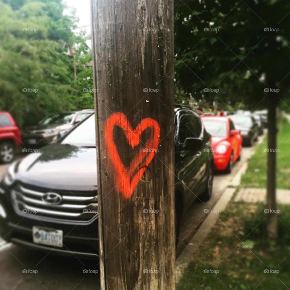 Everyone Needs Some Love; red heart, happy graffiti 