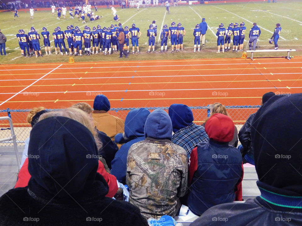 spectators at the football game