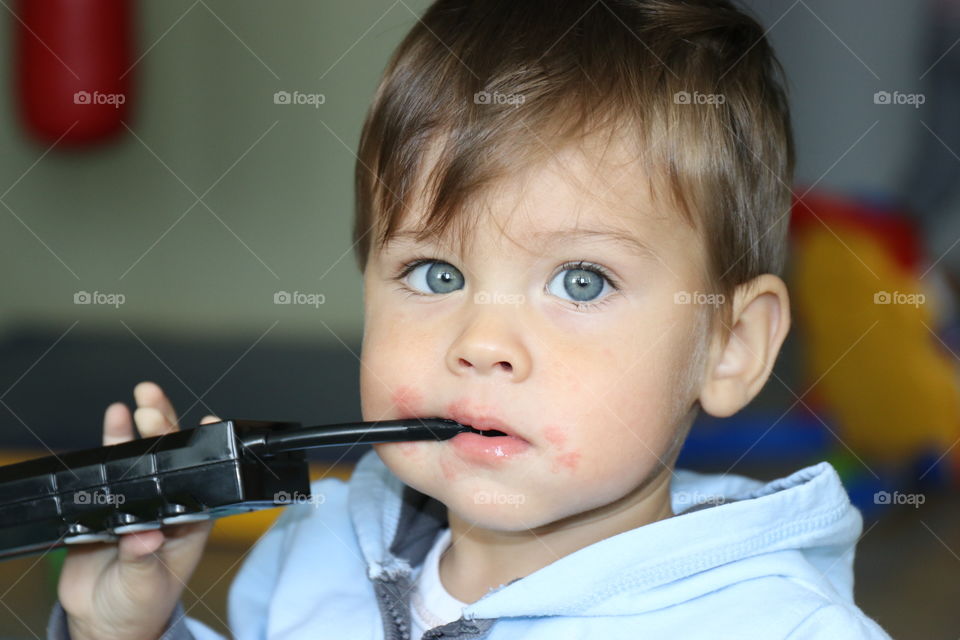 Portrait of a pretty child, a boy with blue eyes