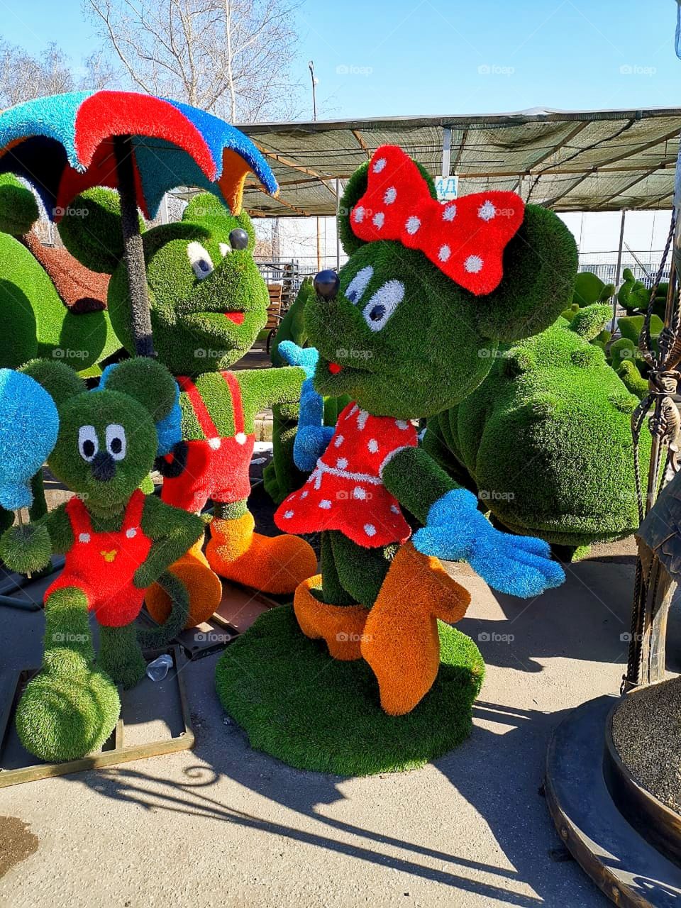 Green material figures decorative disney characters