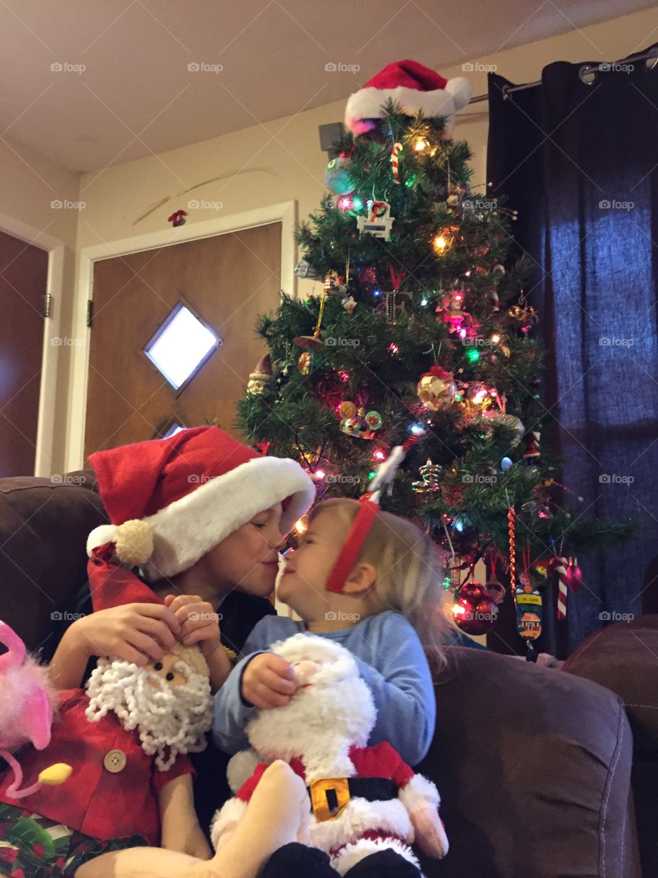 A Christmas kiss kids siblings love 