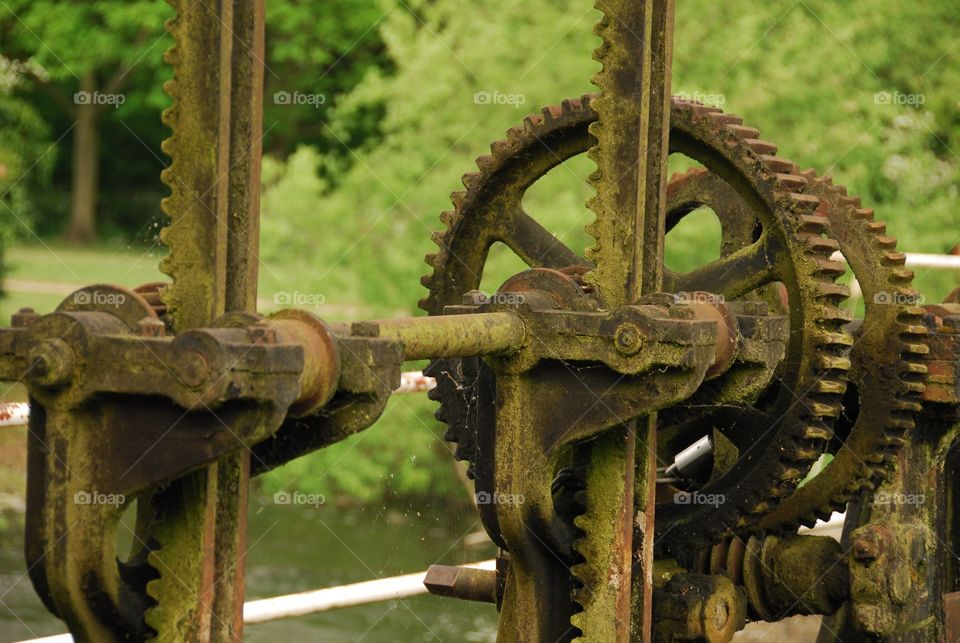 Sluice Gate Mechanism. Iron cog mechanism which controls the flow of water through the sluice gates of the weir pool at Dobbs weir.