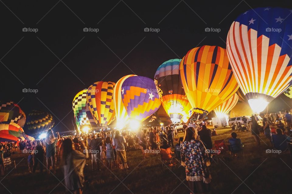 The Balloon Glow at the Great Texas Balloon Race, a field of hot-air balloons lit up at night
