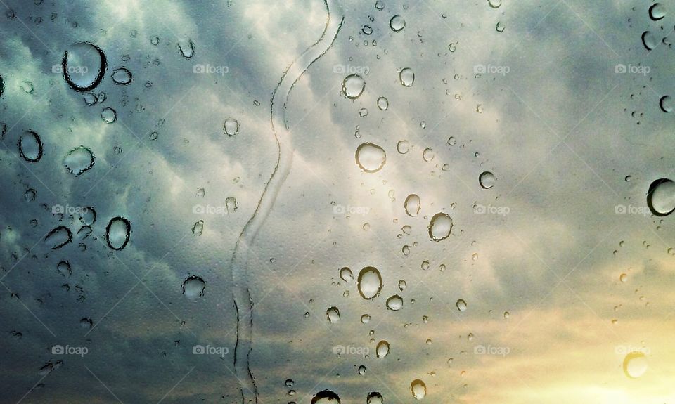 Sun beneath the storm clouds