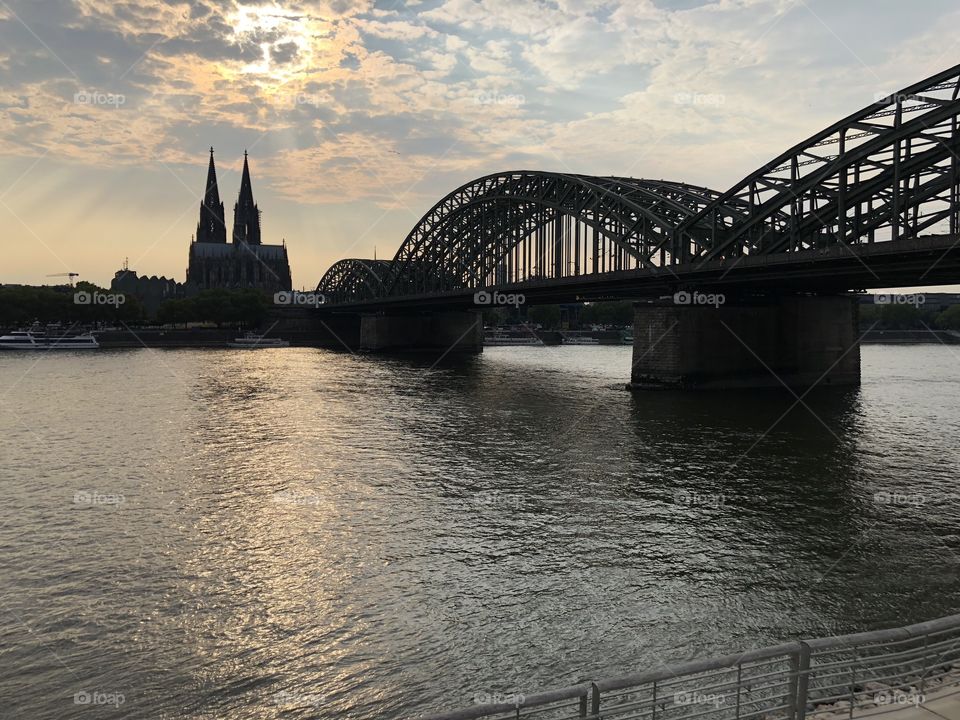 Cologne in Germany. The river Rhein, cathedral and Hohenzollern bridge.