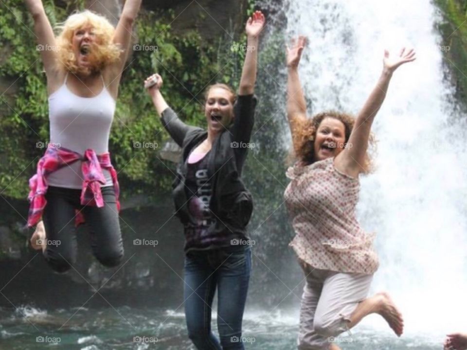 Jumping with laughter in the rain forest of the Philippines 