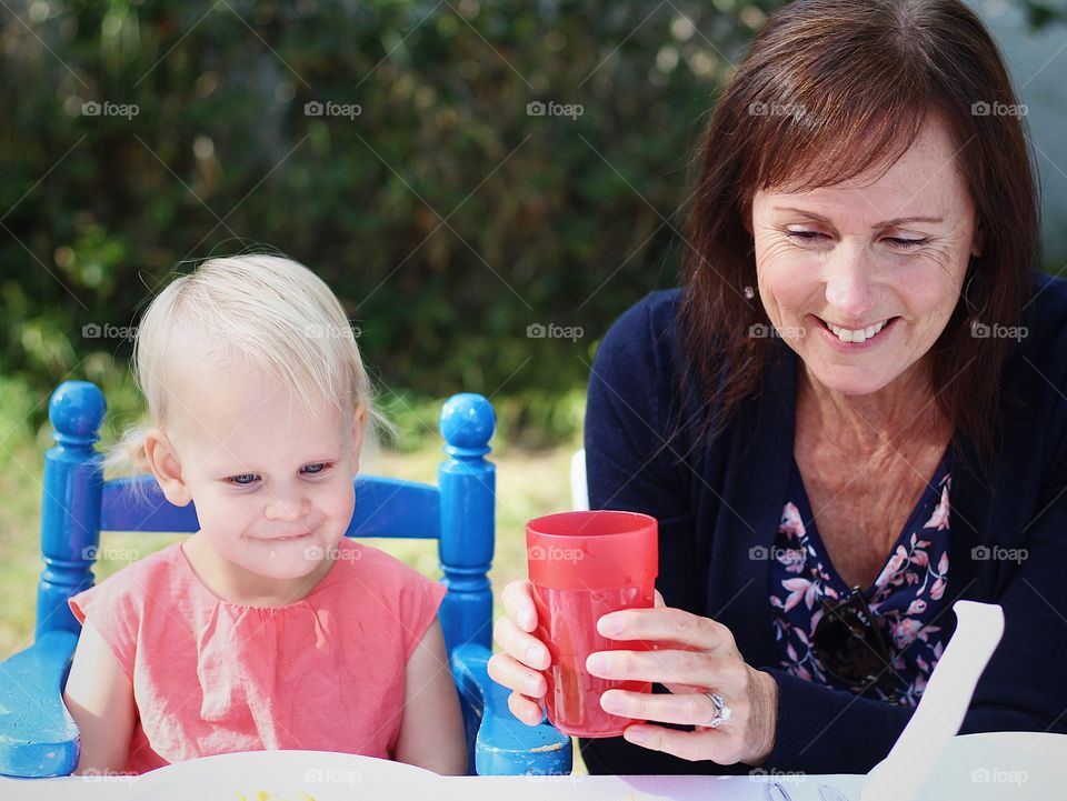 Grandma and beautiful granddaughter always smiling with one another