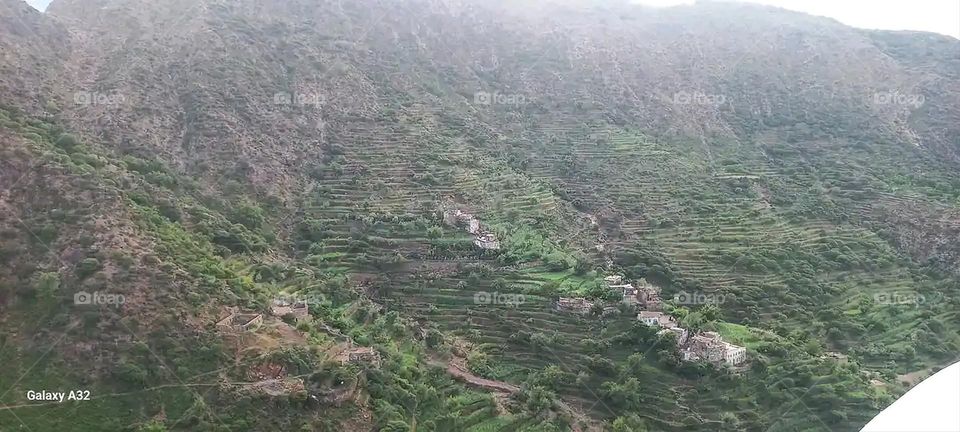 Glory be to God, the magnificent and picturesque view and the natural green trees are a view that is nothing more wonderful than it