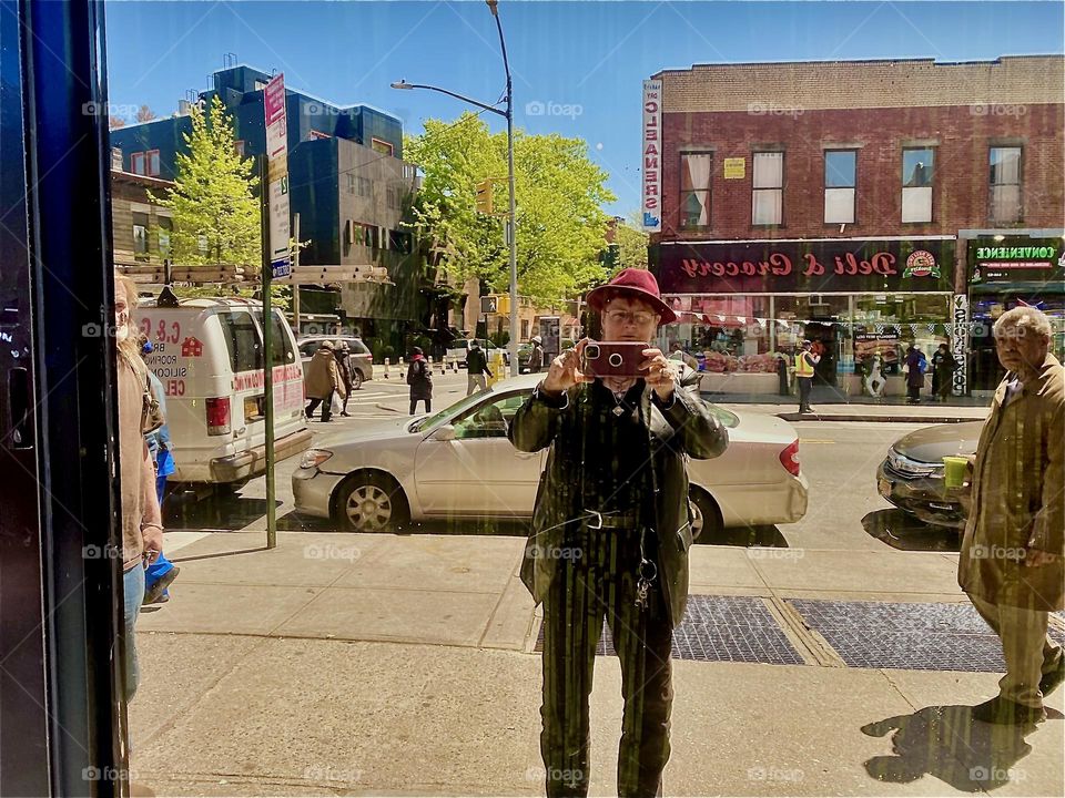 Today I encountered a new window for an “Art Club” on “Fulton St” in “Fort Greene”, Brooklyn with the highly reflective tinted surface that mirrors everything and everyone. 2022. Hypnotic Productions