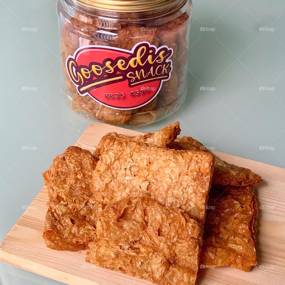 Vegetarian mock goose meat also known as soy crisps in golden hues 