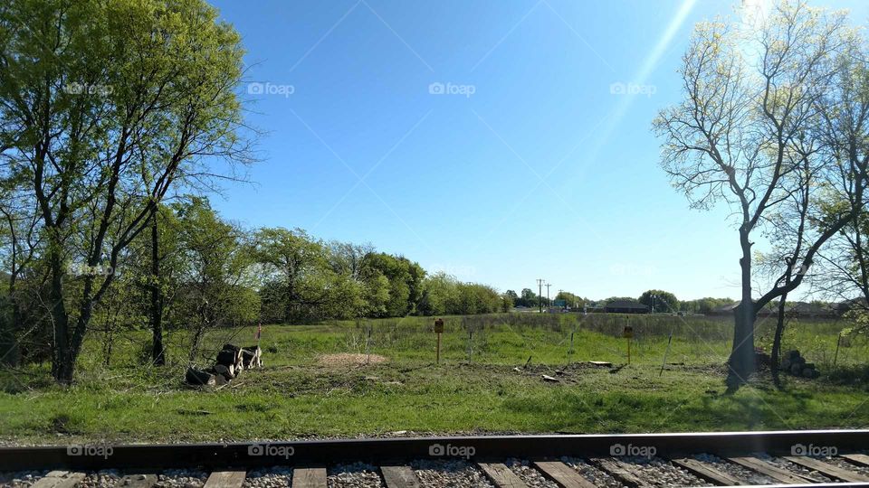 Beautiful Skies Over the Railroad Tracks