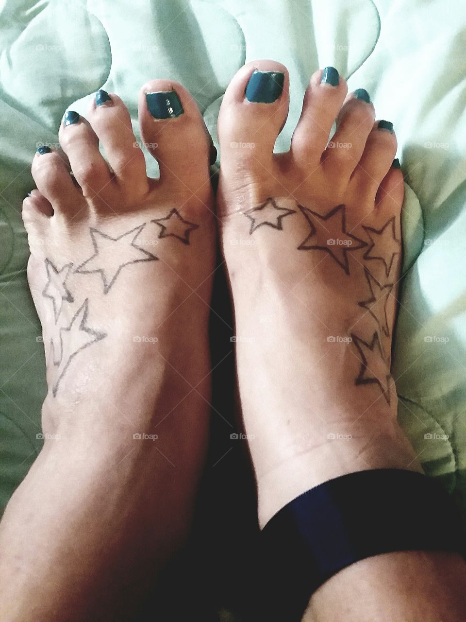 Beautiful tattooed feet