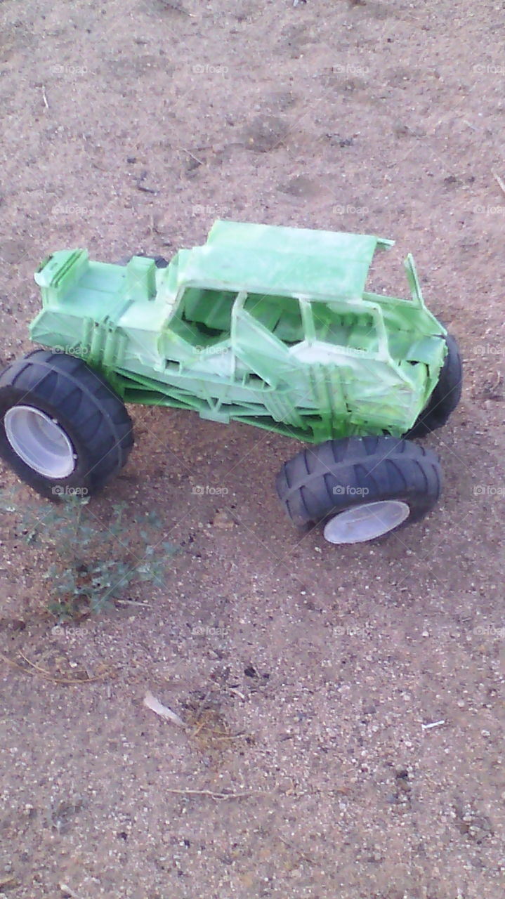 toy truck. my sons beat up toy truck I found out by the trash pile