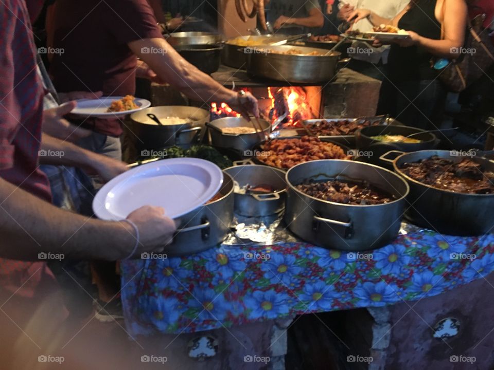 Serving food outside on hot pots outdoor oven party