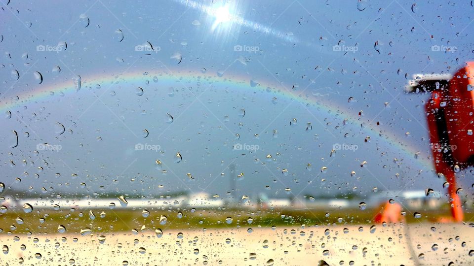 After the Storm. Rainbow through droplets. 