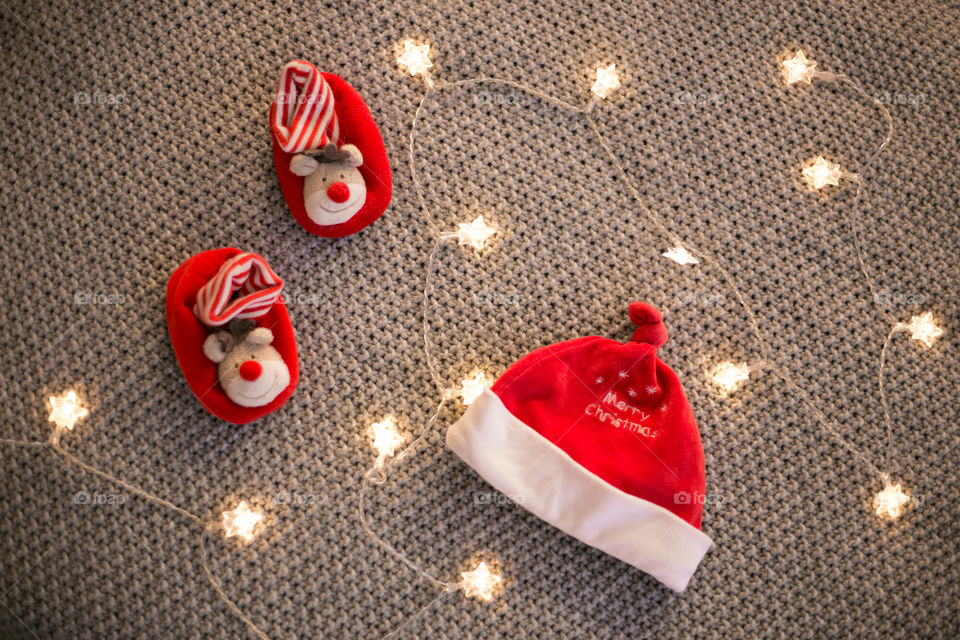 Christmas child set with garland on brown background