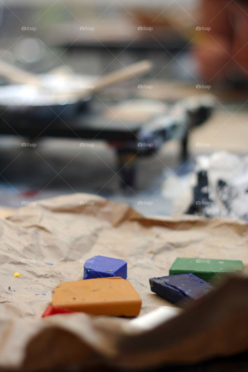 A close up of colorful encaustic paint blocks
