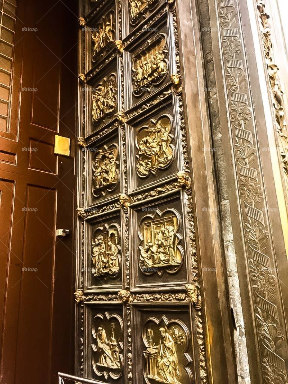 Gothic style rich door decorated with gold