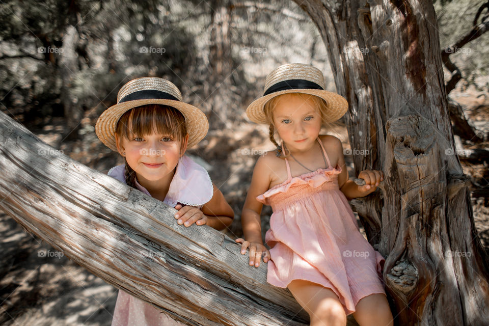 Little sisters playing outdoor