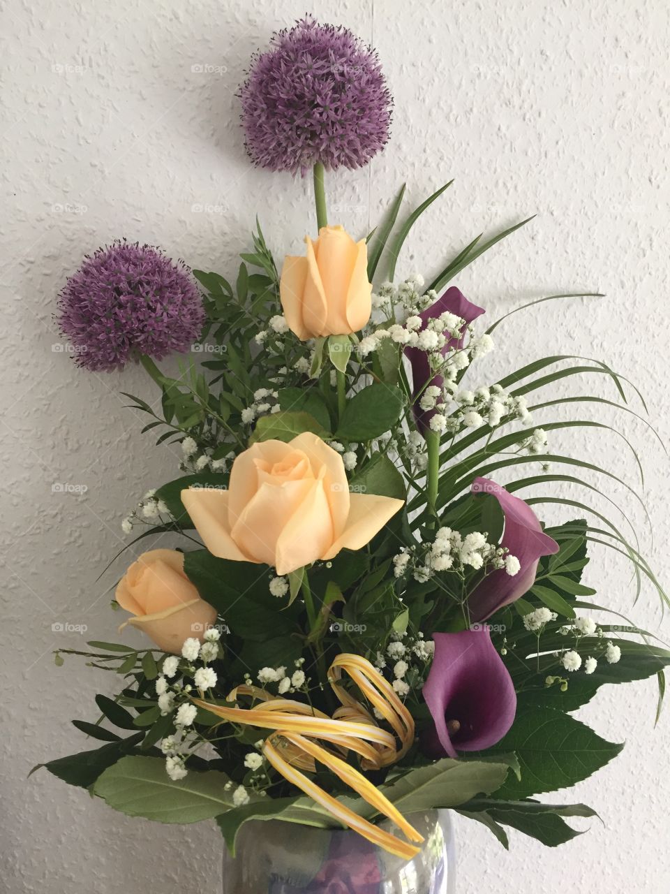 bunch of flowers with roses