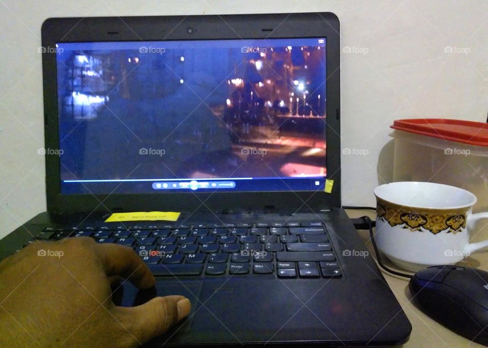 Watching movie on laptop