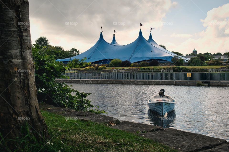 Blue boat in Corrib river at Galway City, Ireland