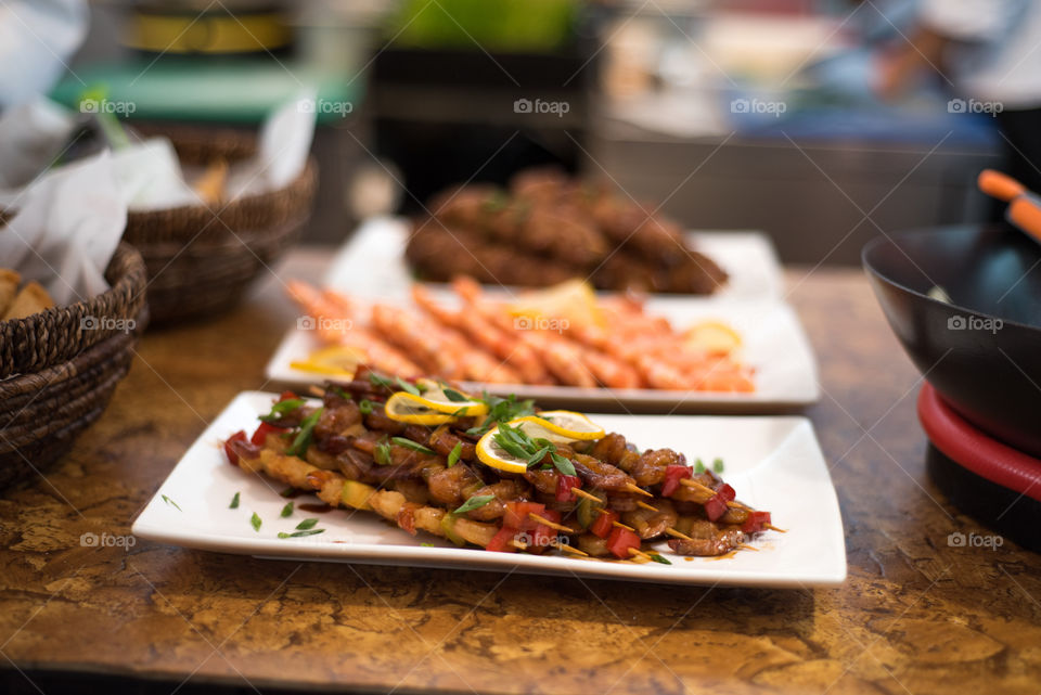 Sea food shish kebab on street food festival