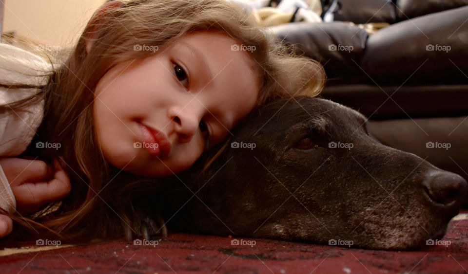 A little girl's love for her dog