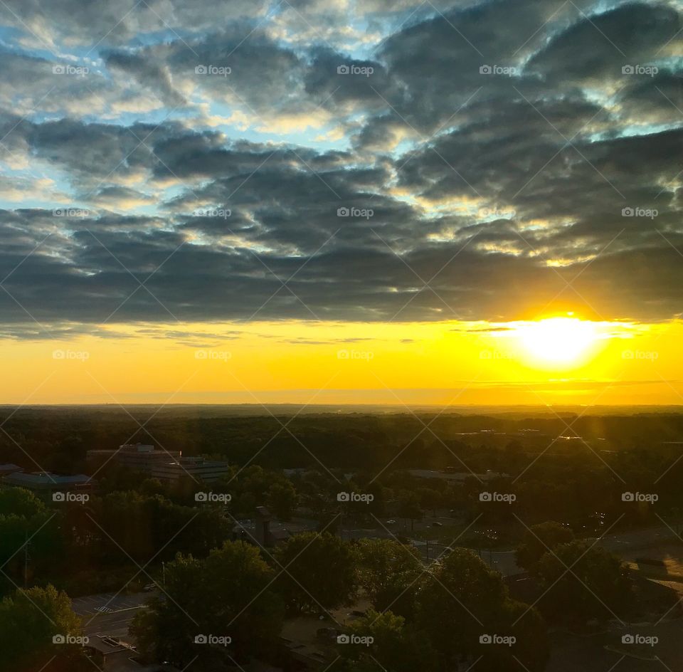 Sunrise peaking through the clouds 