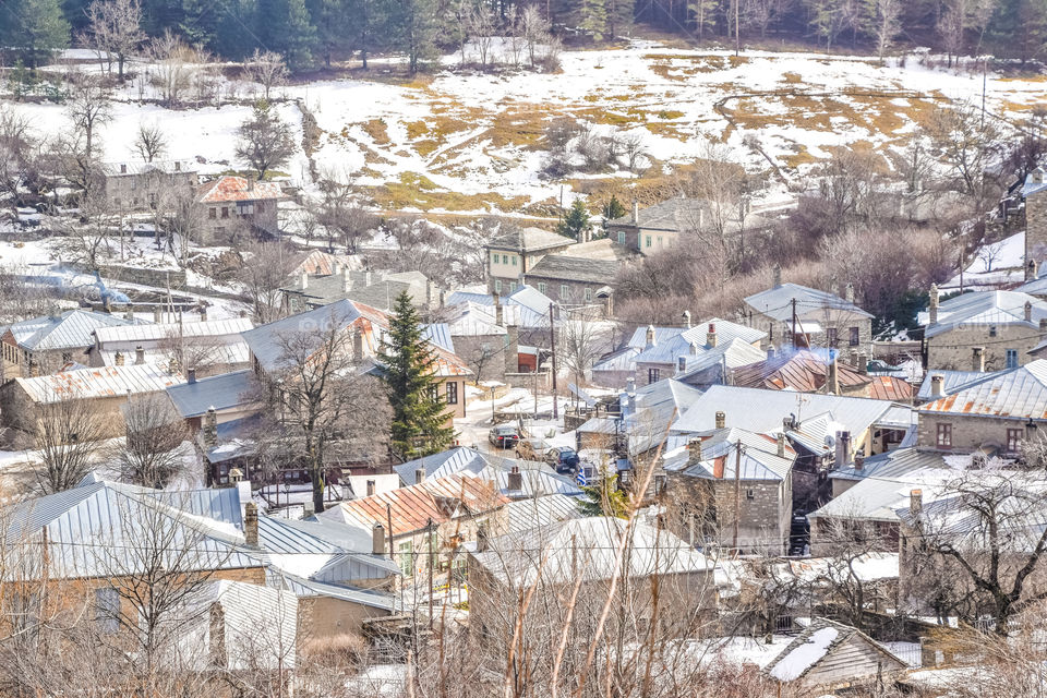 Traditional Snowy Village In Winter
