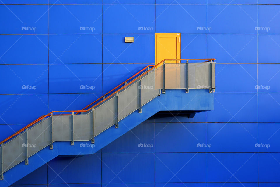 Yellow door and blue wall abstract architecture