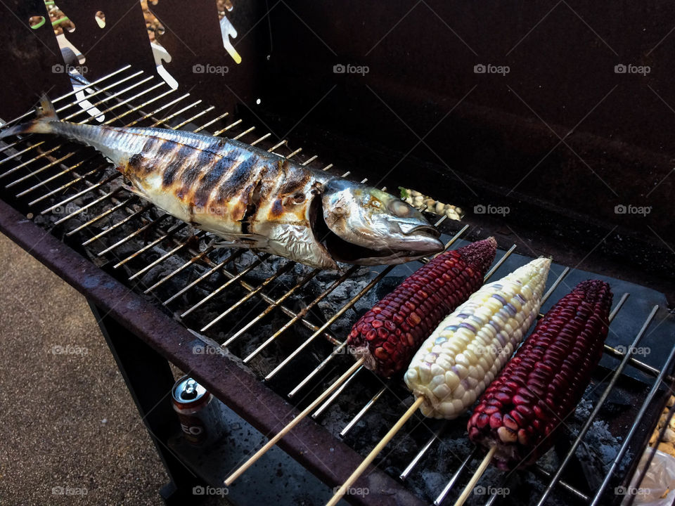 Grilled fish on hot stove