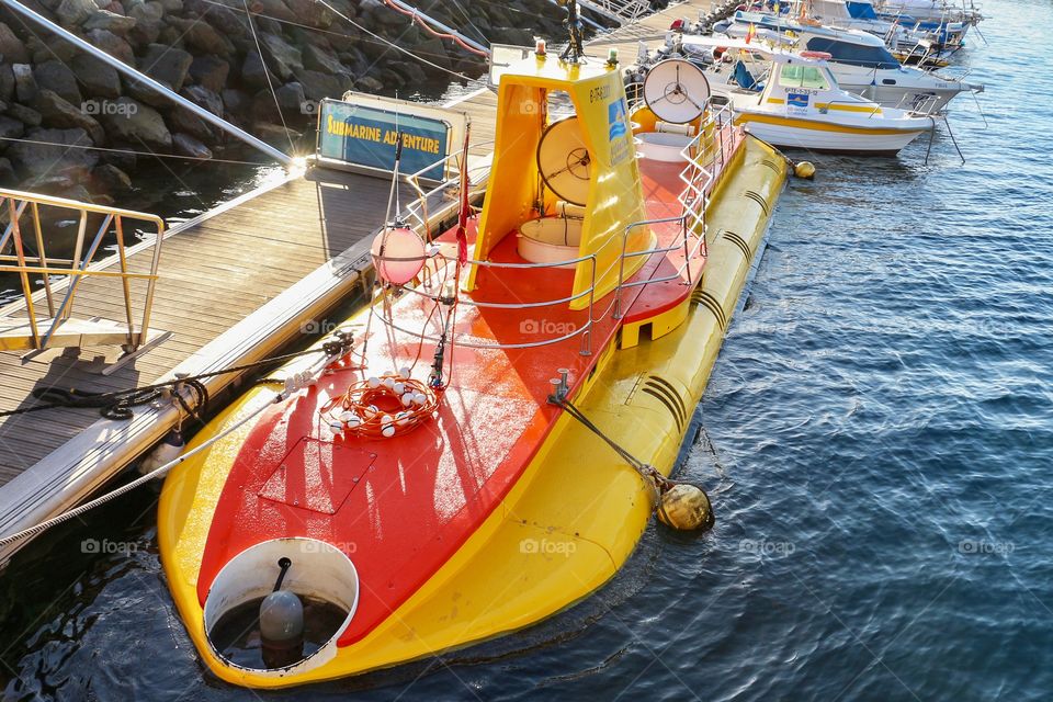 From A to B with yellow submarine in Puerto Mogan, Canary Island, Spain